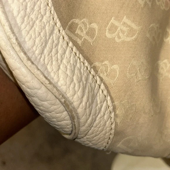 Dooney and Bourke vintage hobo purse in the color cream. - Picture 12 of 14